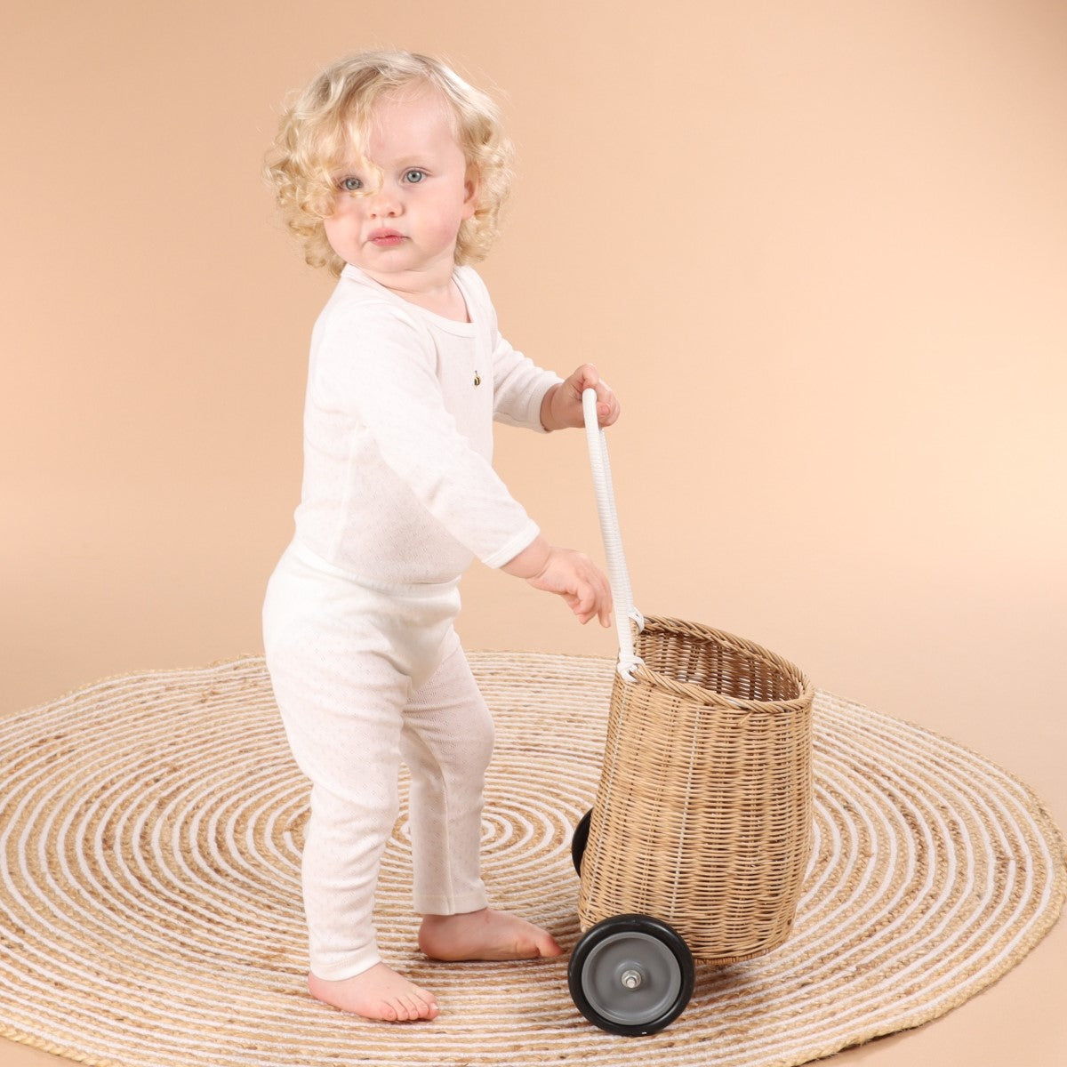 Baby boy wearing cotton legging and long sleeve top with pointelle cotton.
