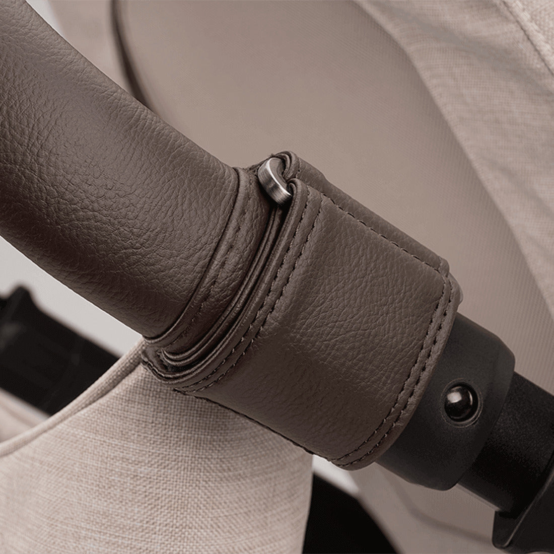 Nuna Stroller organiser in biscotti colour with pouch attached with Minn Next stroller