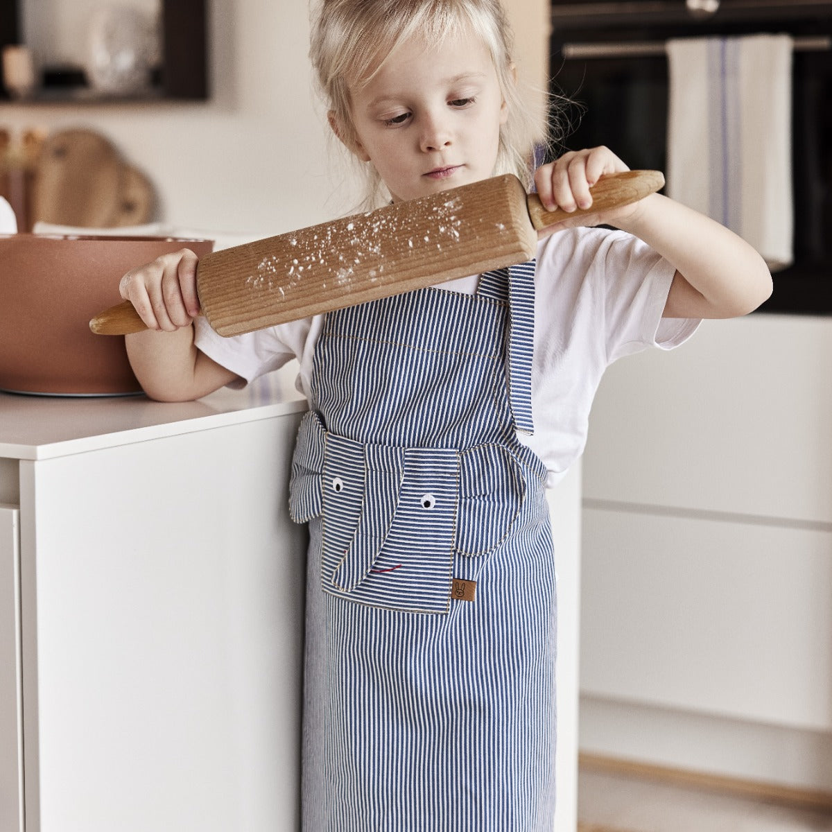 Striped denim elephant apron lifestyle shot