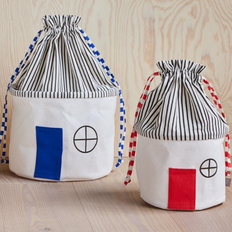 Koya storage basket in Cherry red (small) and Optic Blue (large)
