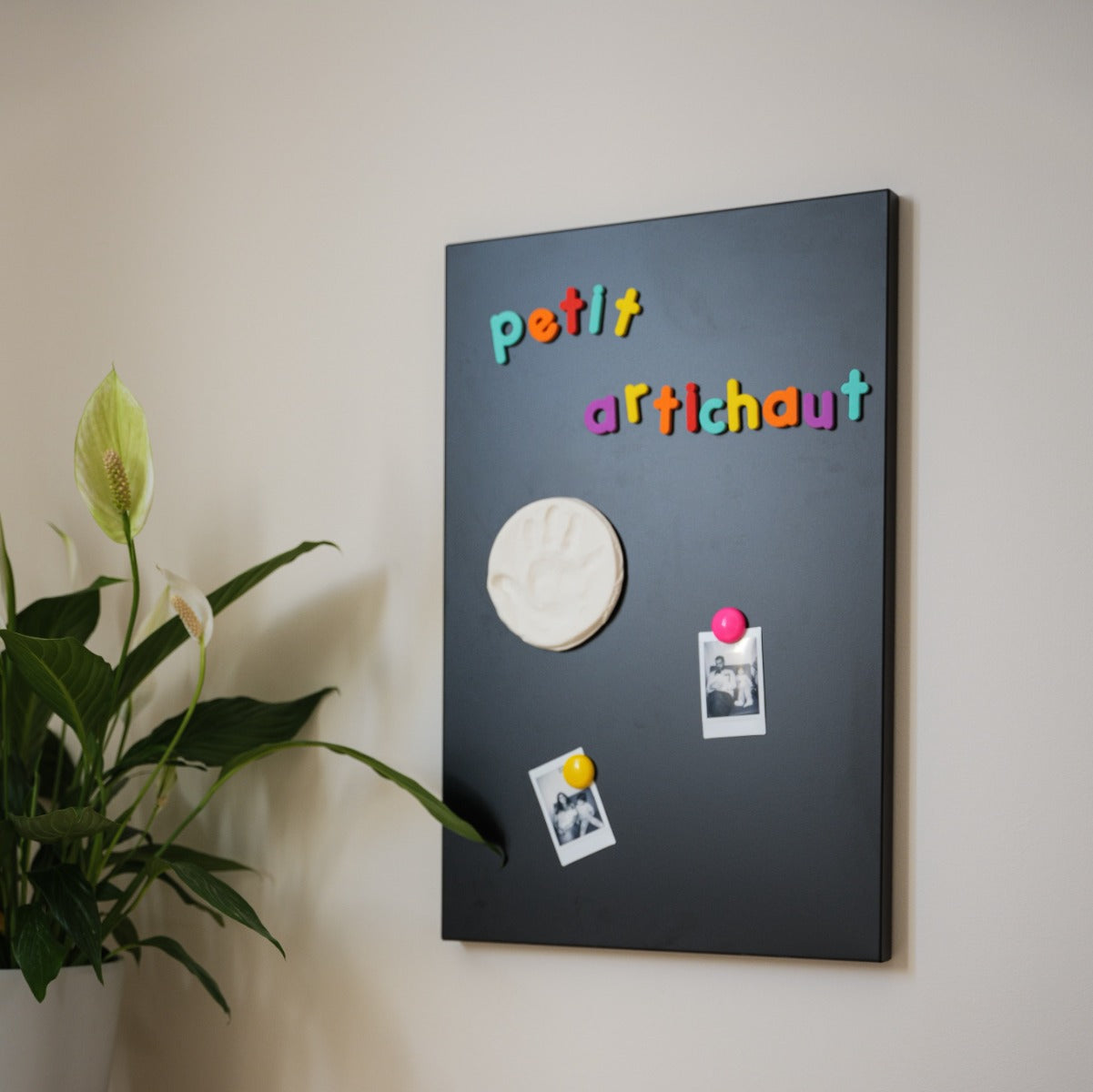 Petit Artichaut 2 Magnetic Keepsakes baby hand print on a board
