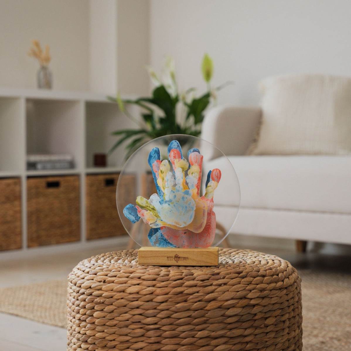 Petit Artichaut family hand imprint on ottoman