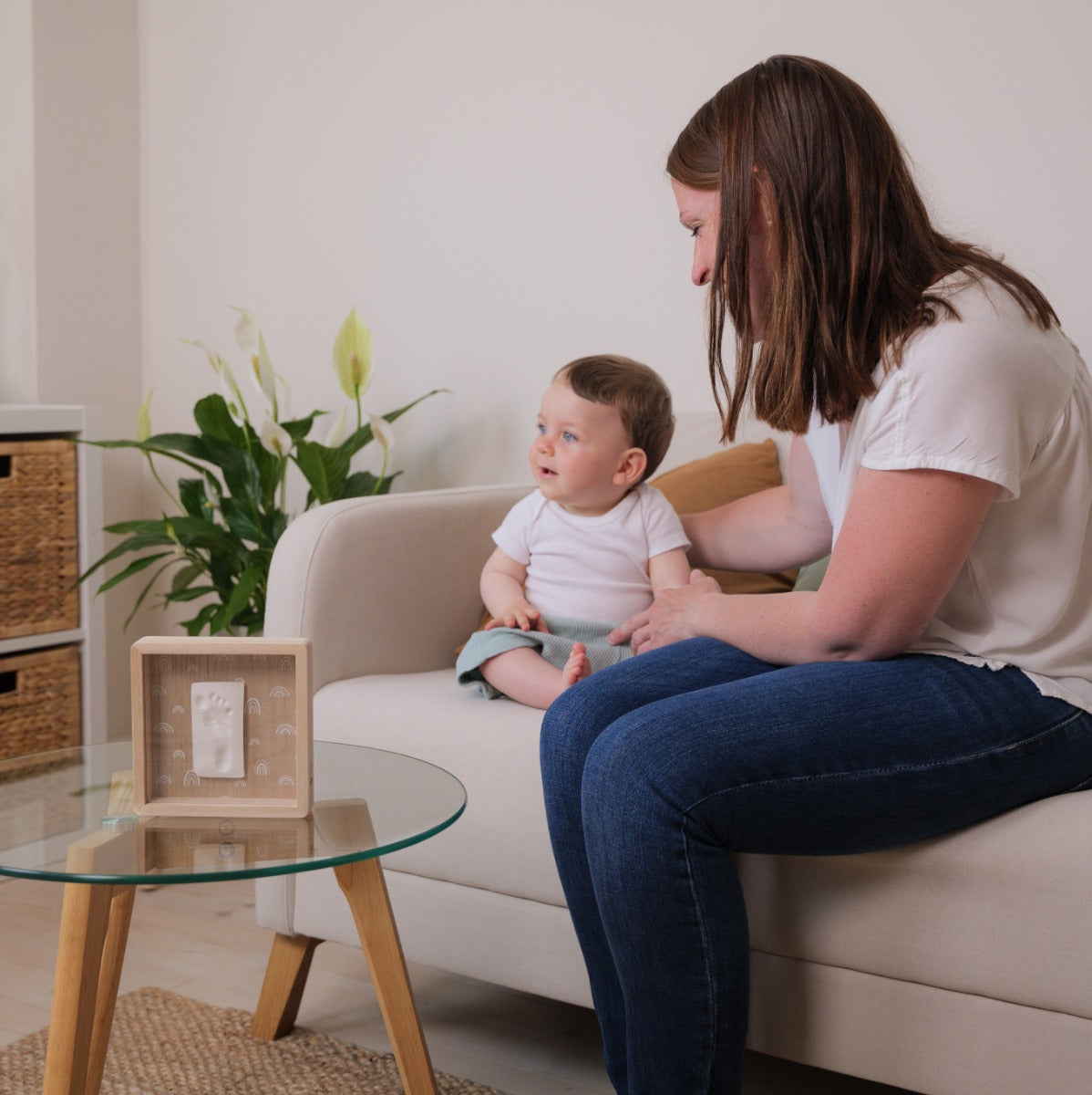 Print Box with Clay imprint of baby on a coffee table