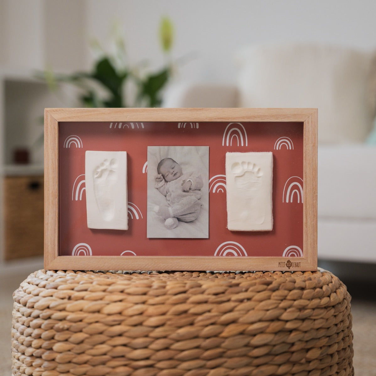 Petit Artichaut 2 Print Frame Rainbow terracotta placed on a small table