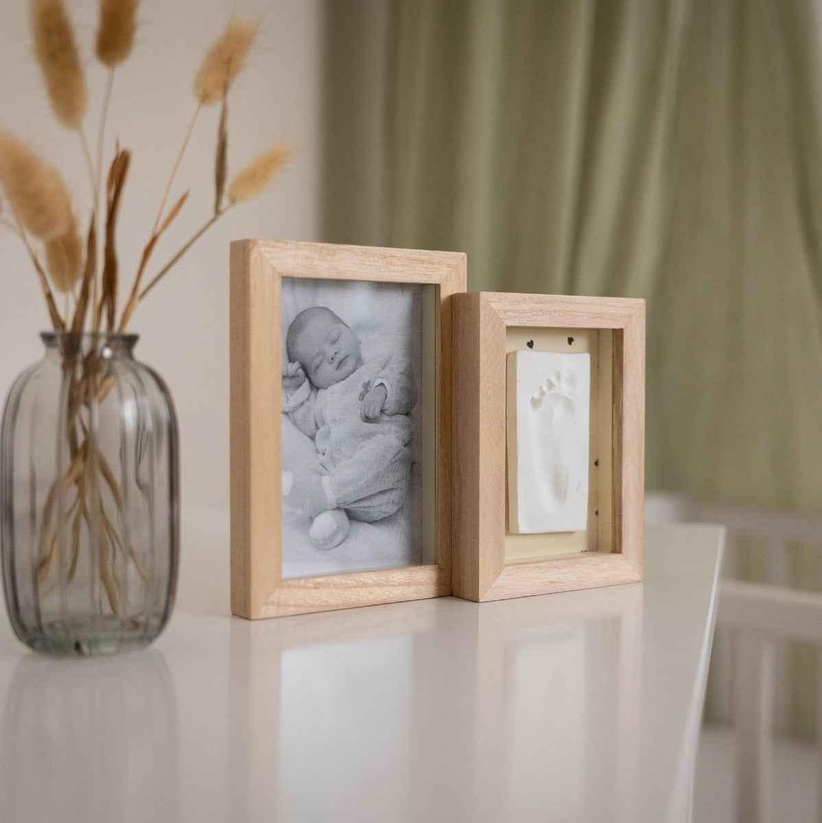 Petit Artichaut 2 frames baby imprint keepsake on a table