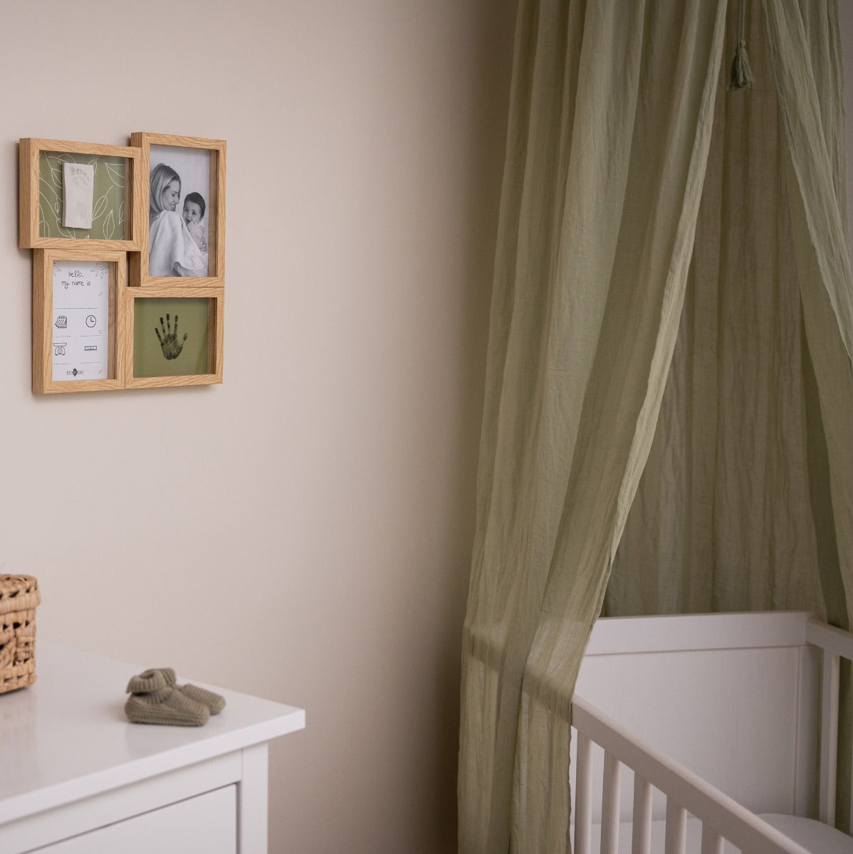 Petit Artichaut puzzle frame baby imprint keepsake with olive background hanging on a wall in nursery as decor
