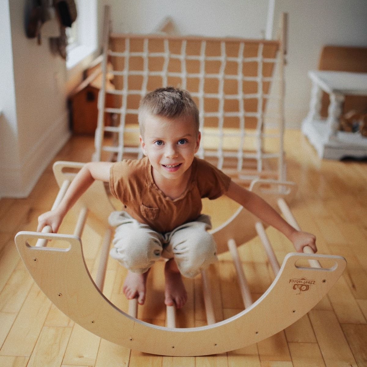 Child playing in Kinderfeets Rocking & Climbing Arch 