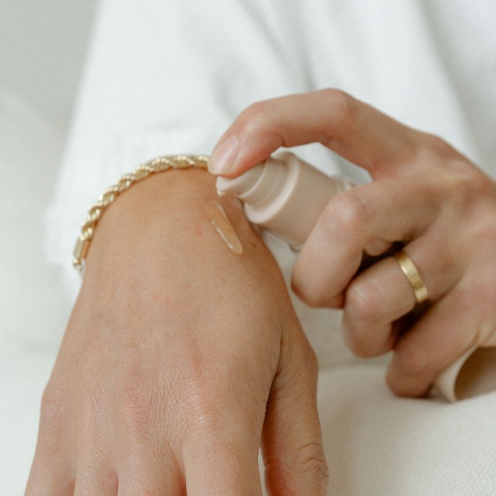 Woman using Perineal Massage Oil