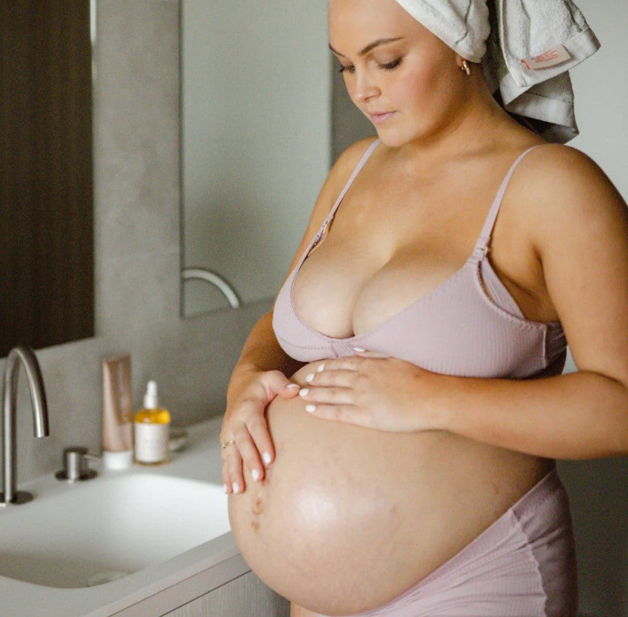Pregnancy Care Set oil on pregnant belly