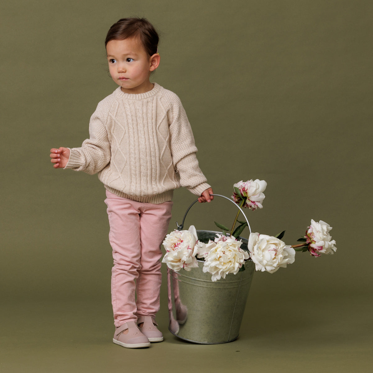 baby girl wearing pretty brave shoes in blush