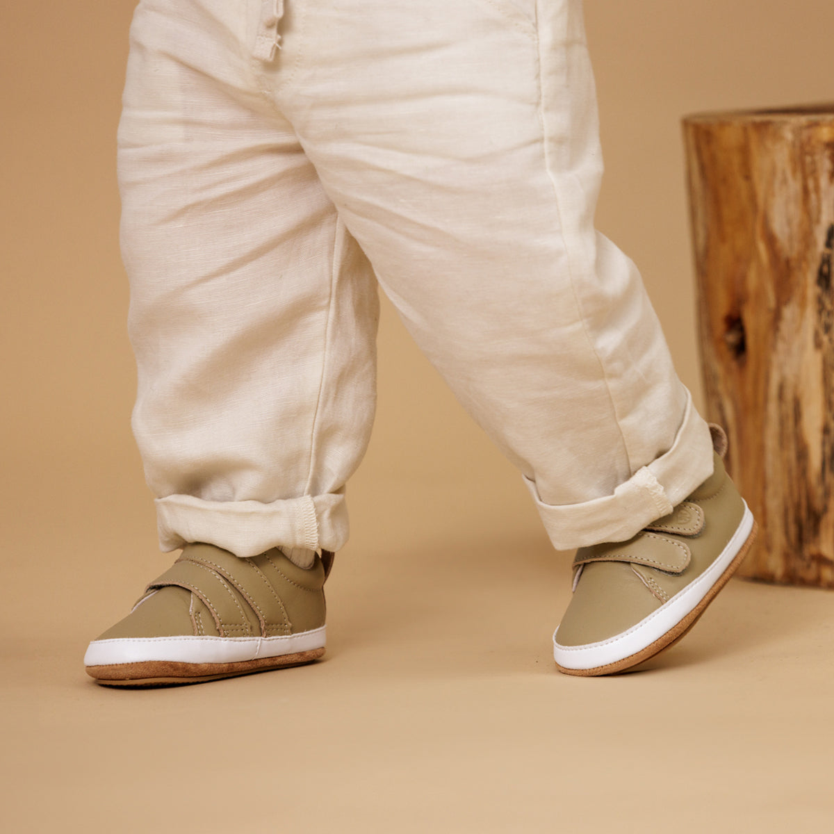 Baby wearing sage leather shoes with Velcro:image,small_image,thumbnail