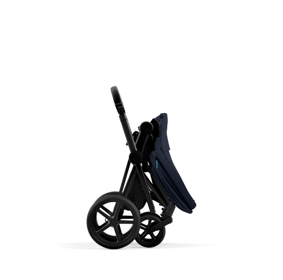 Priam Pram 2022. Matt Black + Midnight Blue Plus by Cybex folded standing