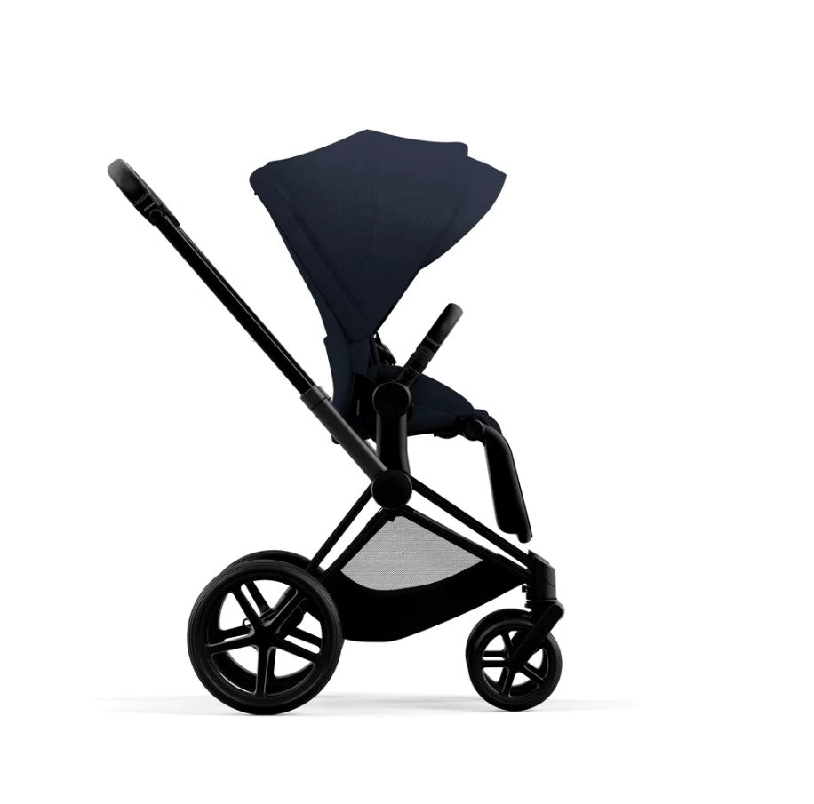 Priam Pram 2022. Matt Black + Midnight Blue Plus by Cybex side view facing forward