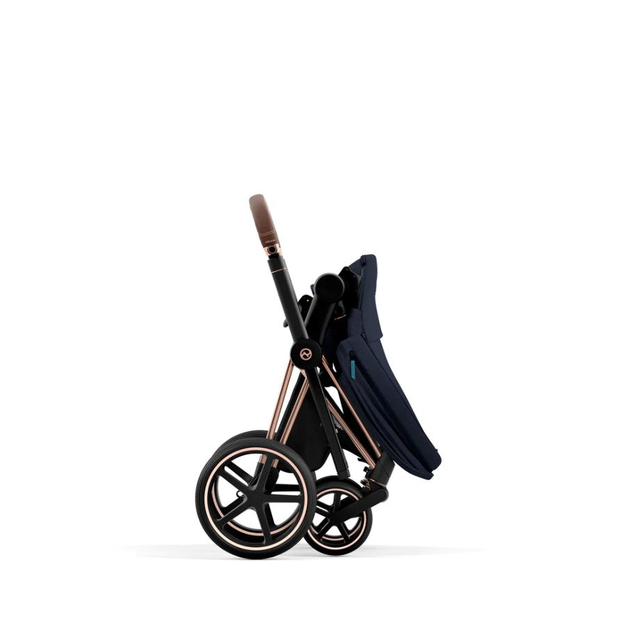 Priam Pram 2022. Rose Gold + Midnight Blue Plus folded standing