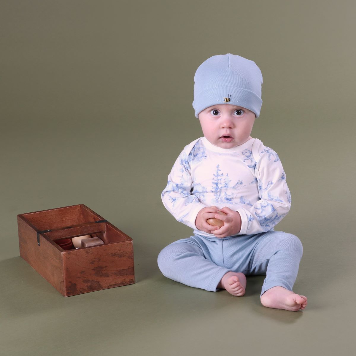 Baby boy wearing Cotton wolf & Bear bodysuit with beanie and pant