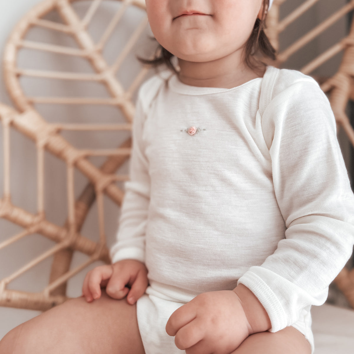 Dimples by Jane Anne Merino Bodysuit Lifestyle Shot