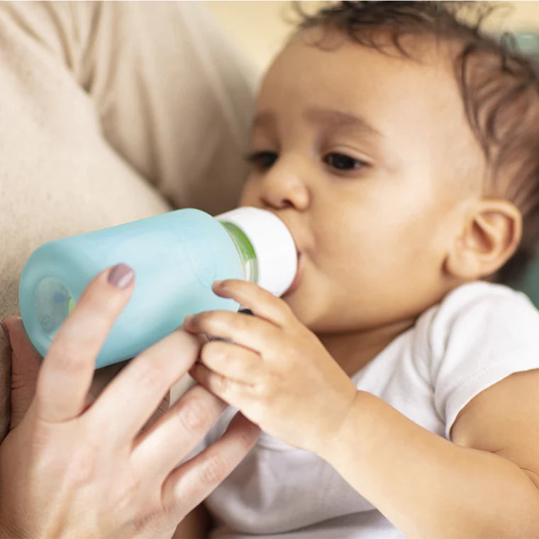 Mother feeding baby with Dr Brown's Narrow Neck Glass Bottle Level 1 - 120ml