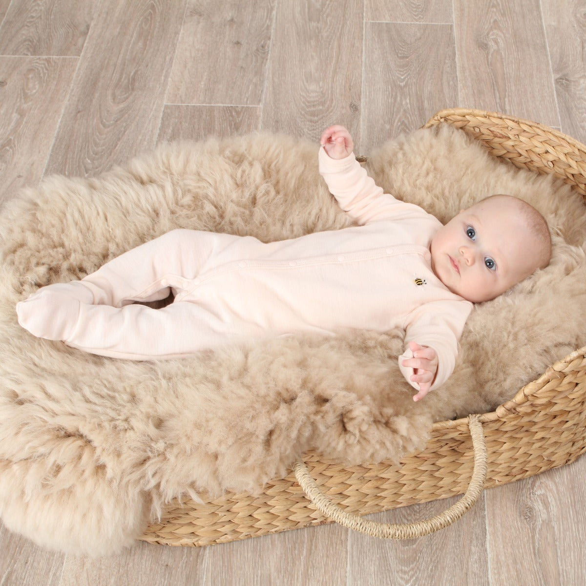 Dimples Snowglobe Merino Babygrow Eggnog bee on baby