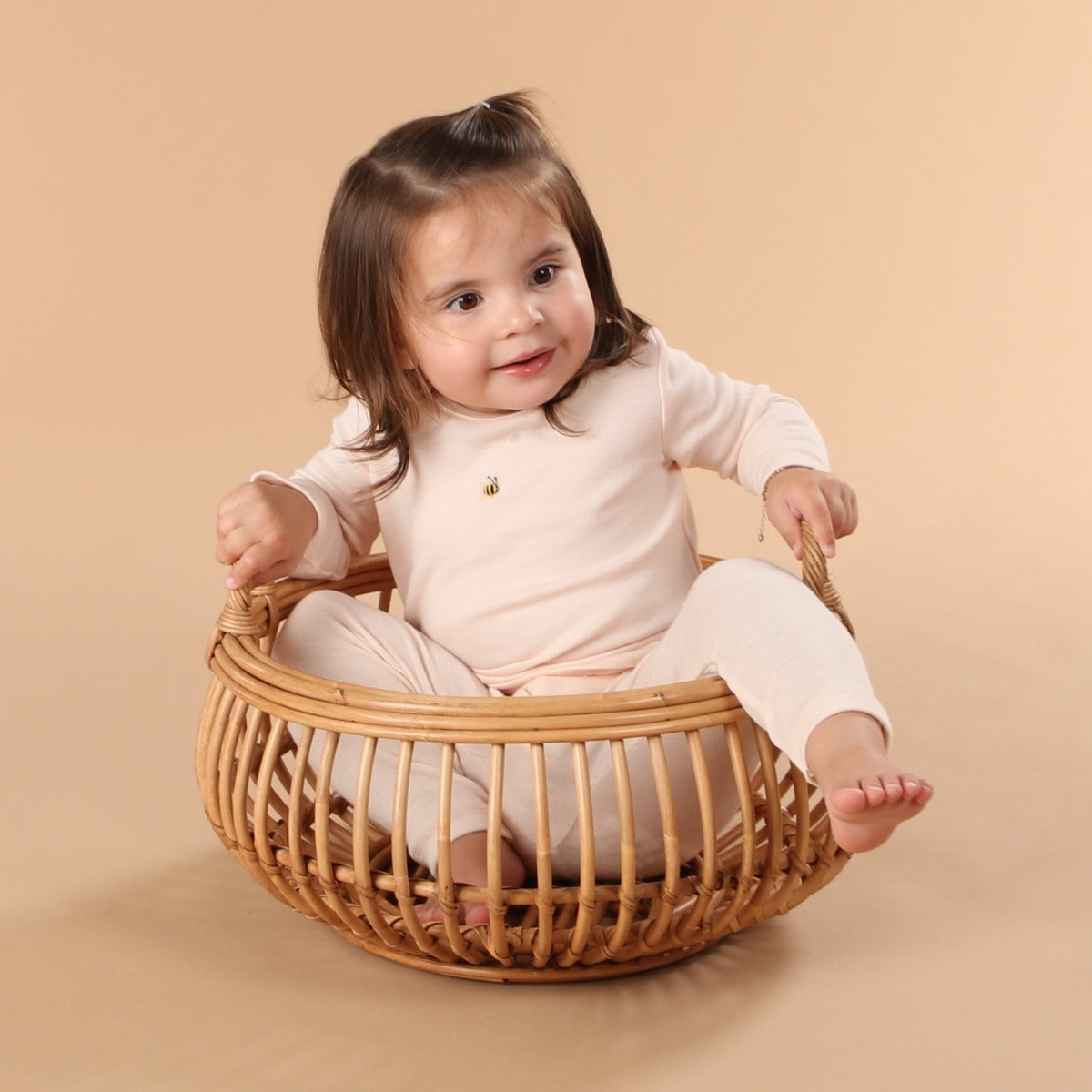 Dimples Snowglobe Merino Long Sleeve Top Eggnog on baby