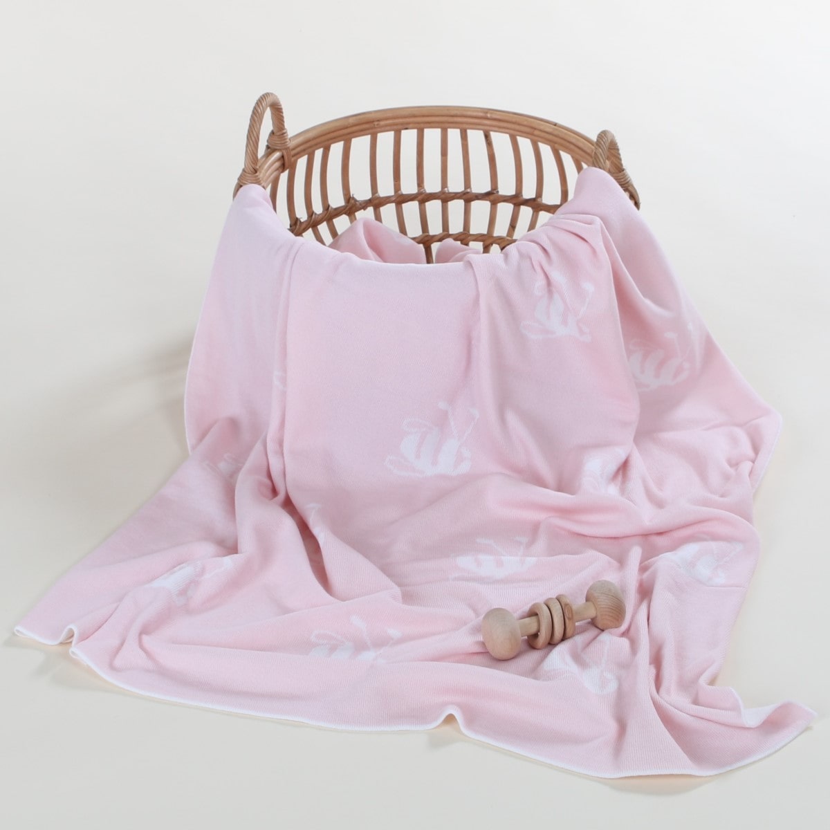 Dimples merino wool signature bee blanket in pink