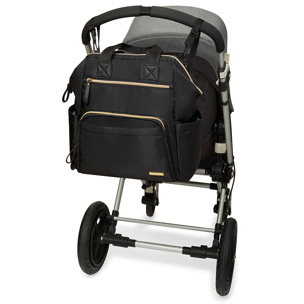 Main Frame Wide Open Backpack from Skip Hop in black attached to a stroller
