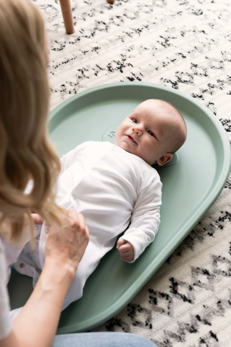 Kid on Shnuggle Squishy Bath Mat eucalyptus
