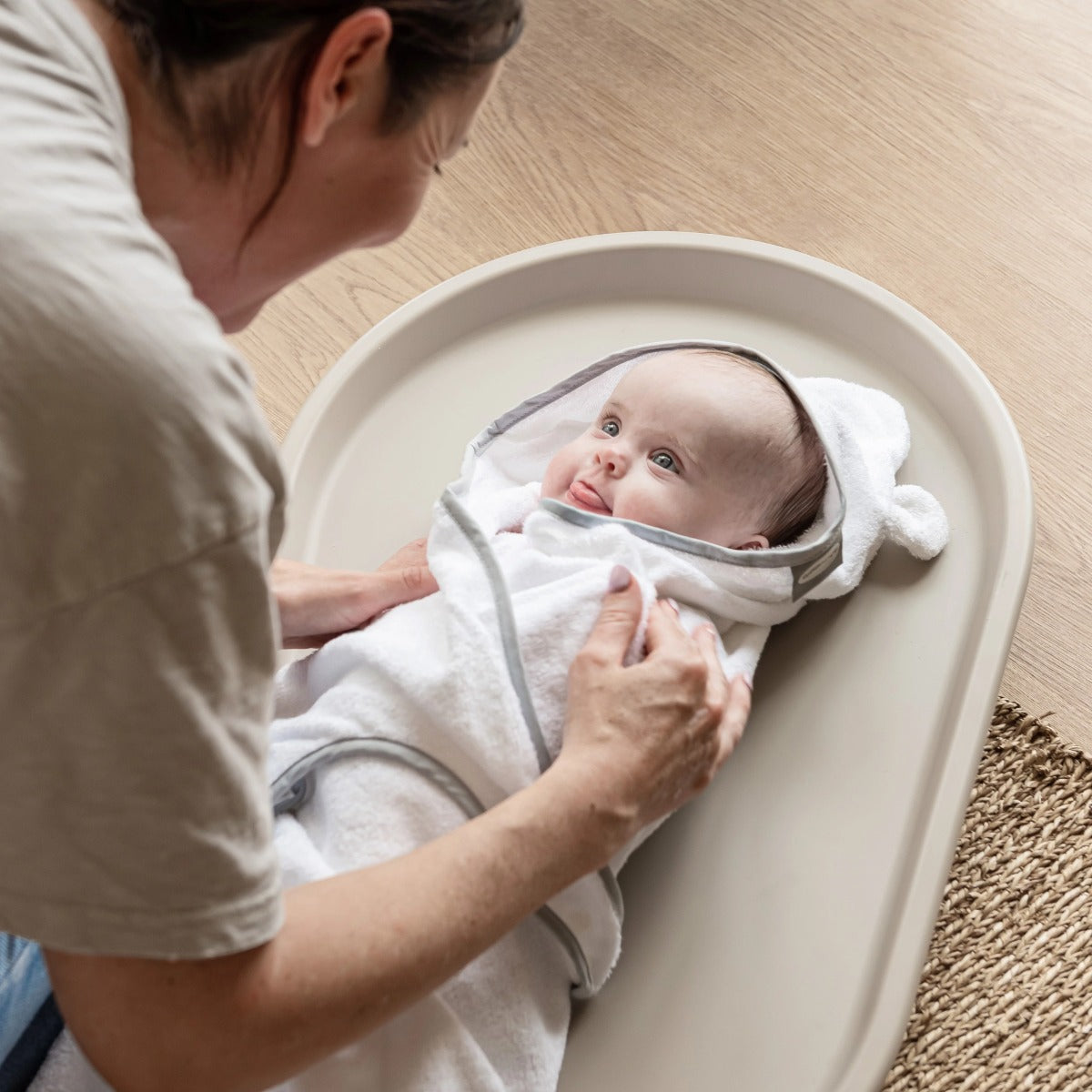 Shnuggle Squishy in Taupe by Shnuggle with child