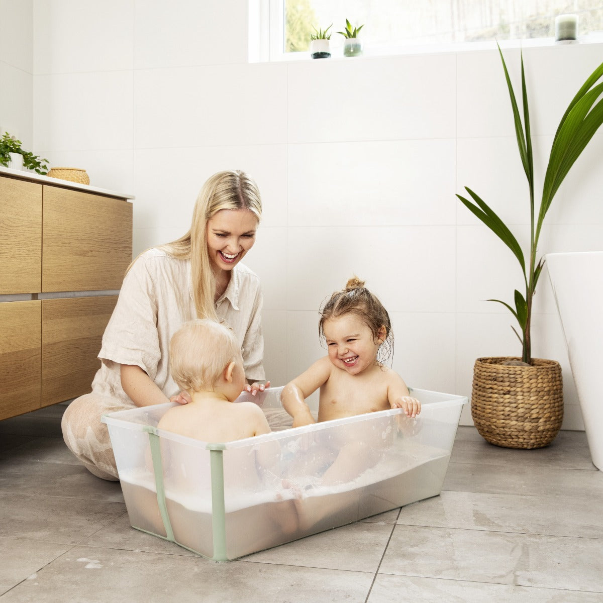 Mother bathing baby in Xtra Large Flexi Bath