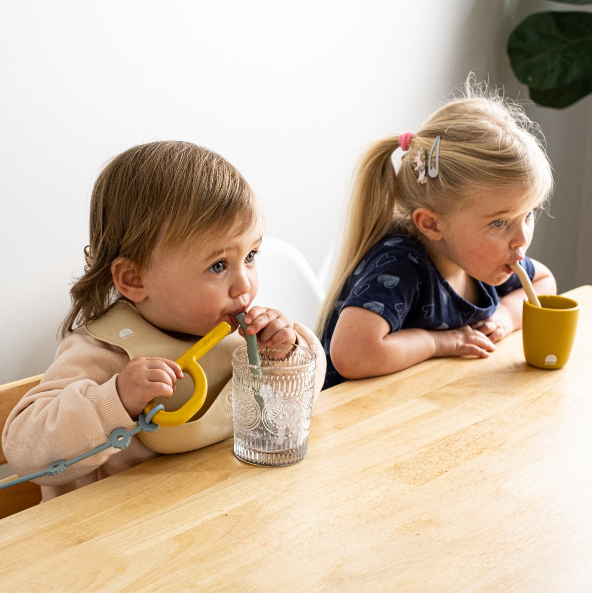 Babies drinking smoothie with Zazi silicone straw