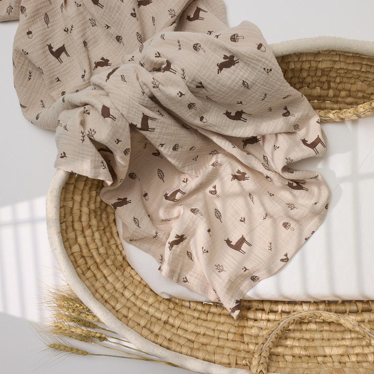 Over the Dandelions Muslin Swaddle in woodland print