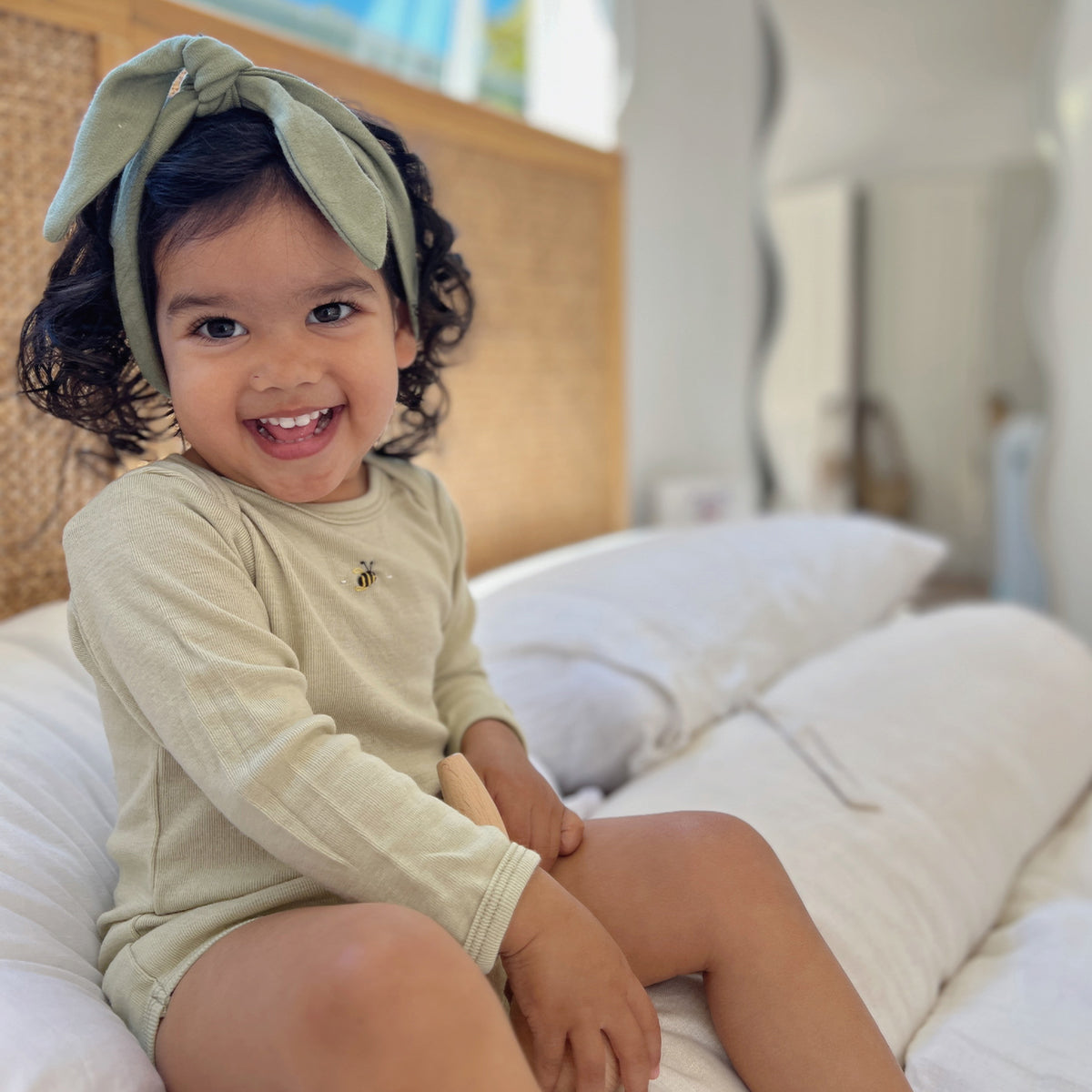 Merino Tea Green long sleeve body suit from Cosy dreams collection of Dimples 