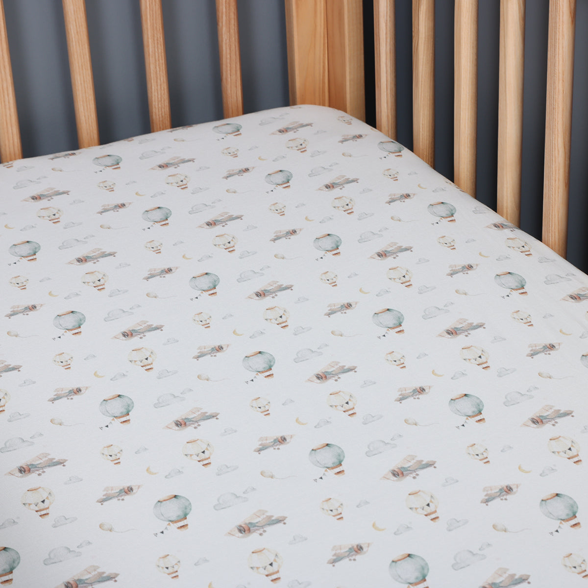 Cotton Fitted Cot sheet in a cot