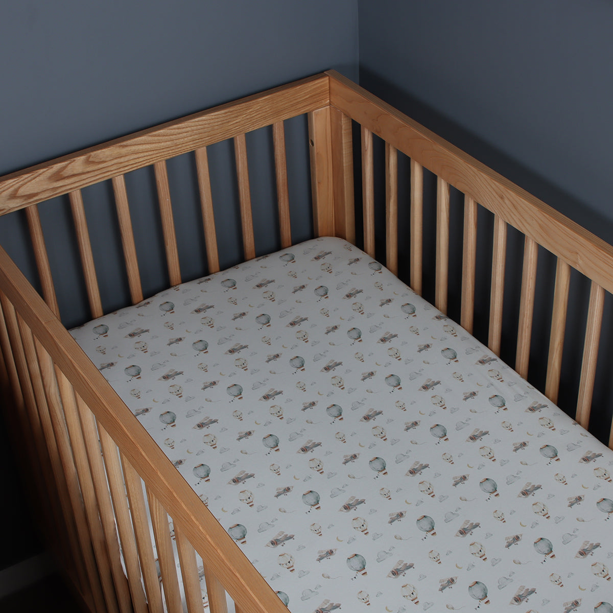 Cotton Fitted Cot sheet in a cot in nersery