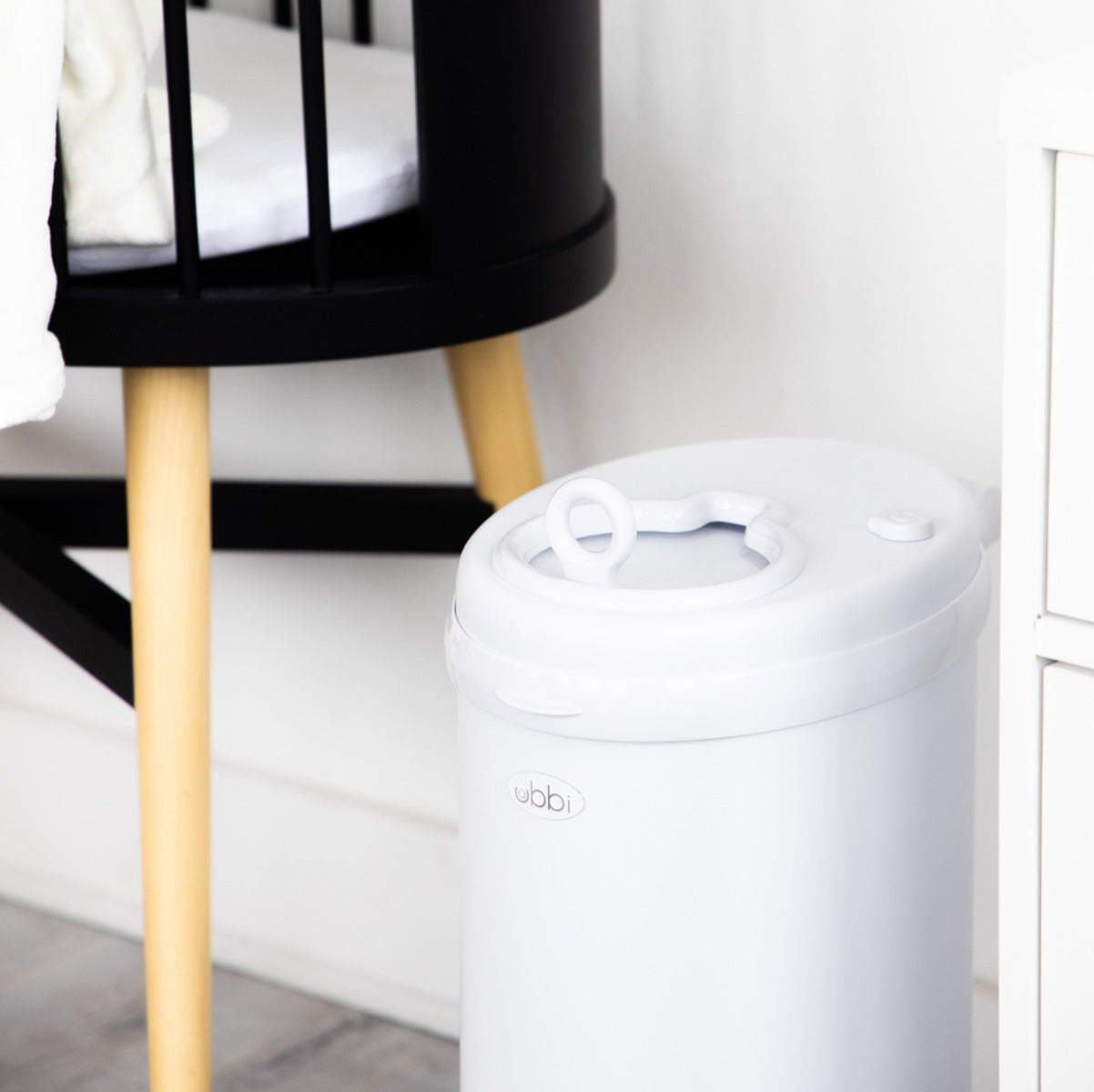 Ubbi Nappy Bin in White in nursery
