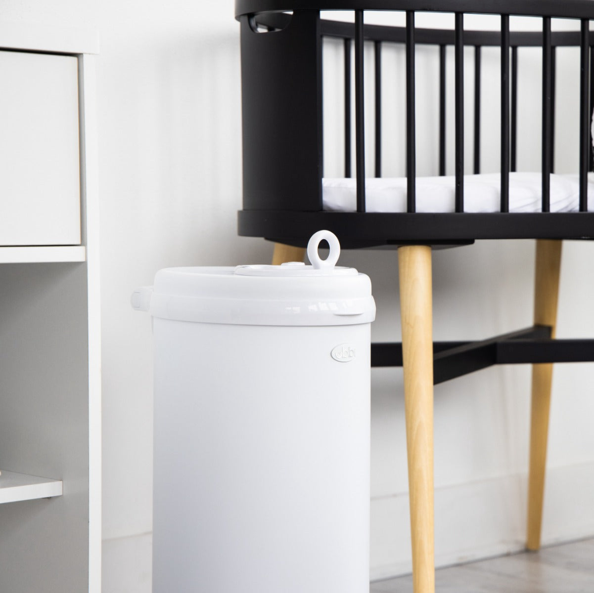 Ubbi Nappy Bin in White in nursery