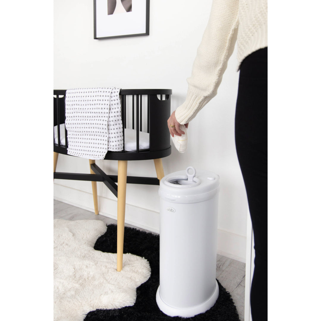Ubbi Nappy Bin in White in nursery