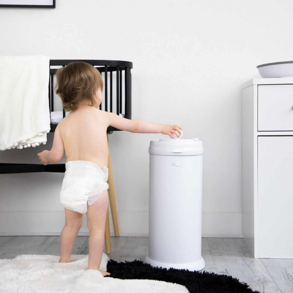 Ubbi Nappy Bin in White in nursery