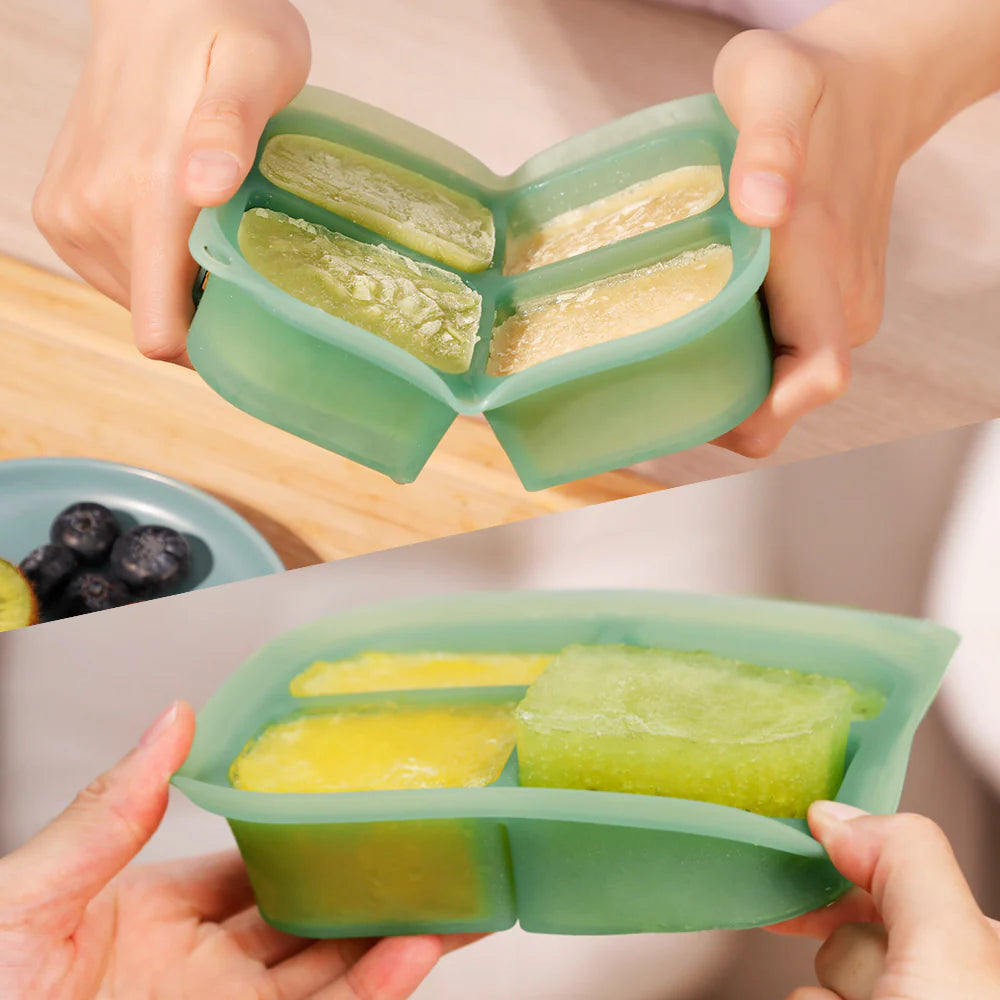 4 compartment freezer tray with lid in pea green from Haakaa with freeze fruit