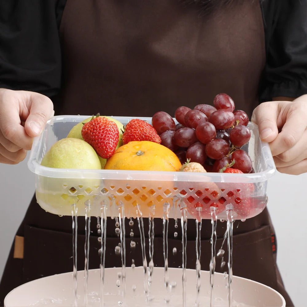 Fruits washing in Family Stack lunch box from Haakaa container