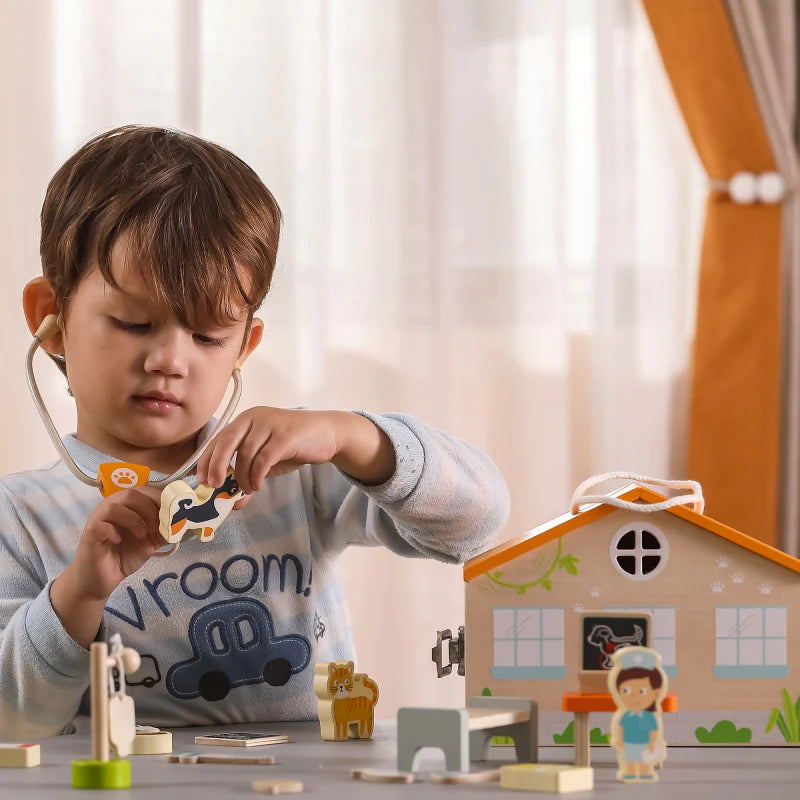 Boy playing with Viga Pet Hospital Set box as doctor and treating pet