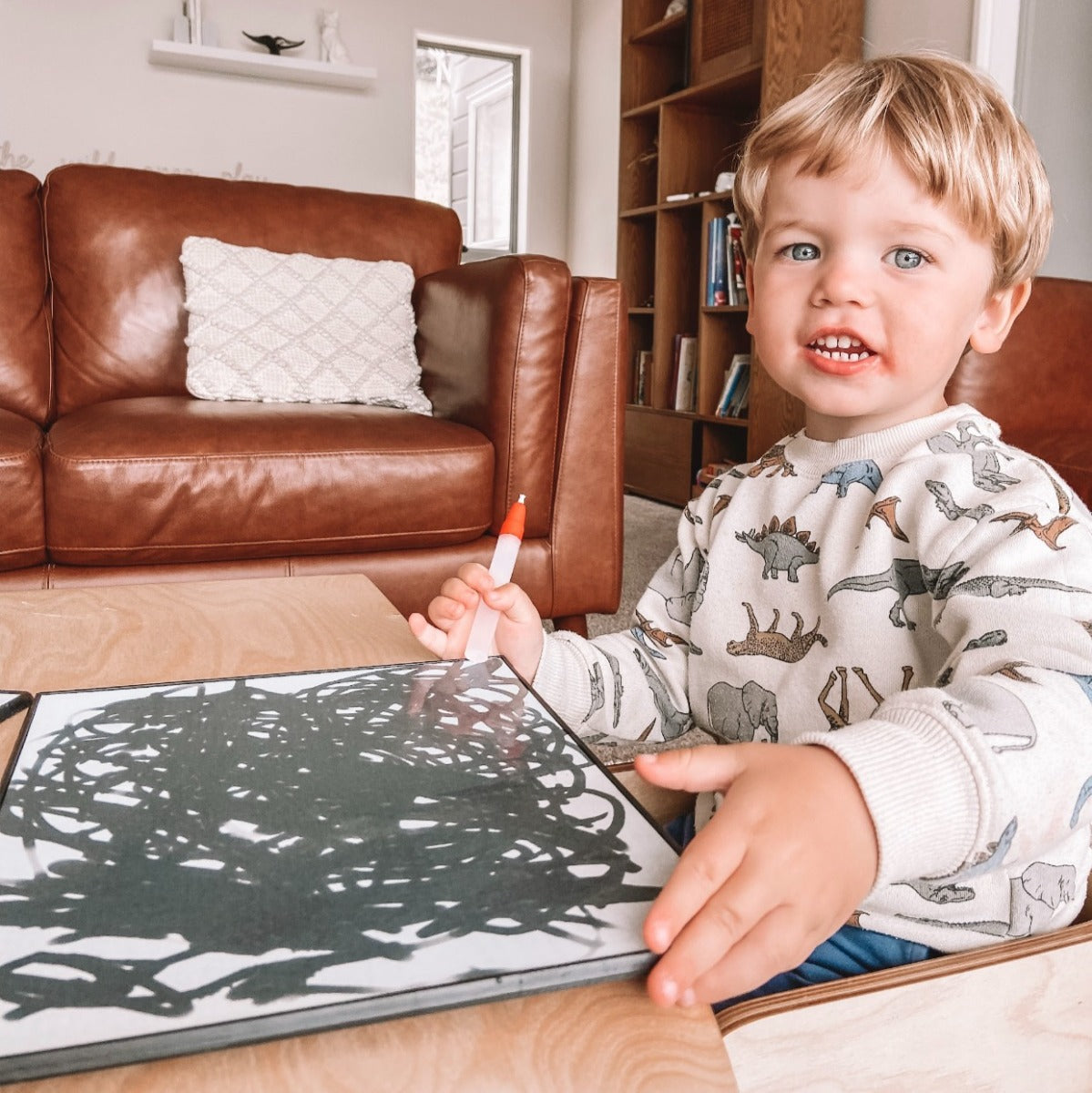 Baby playing with Magic Water - painting Board + 2 pens
