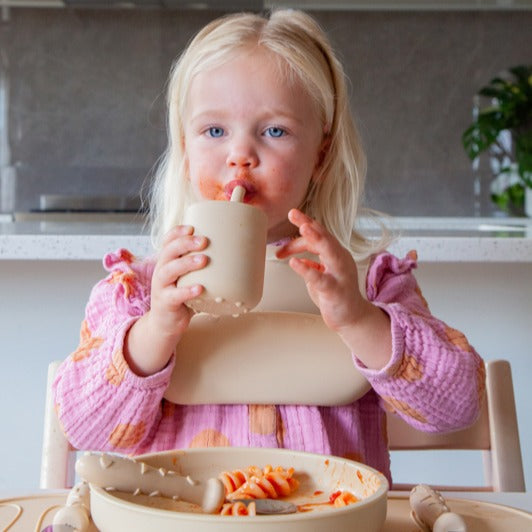 Baby drinking water from zazi clever cup