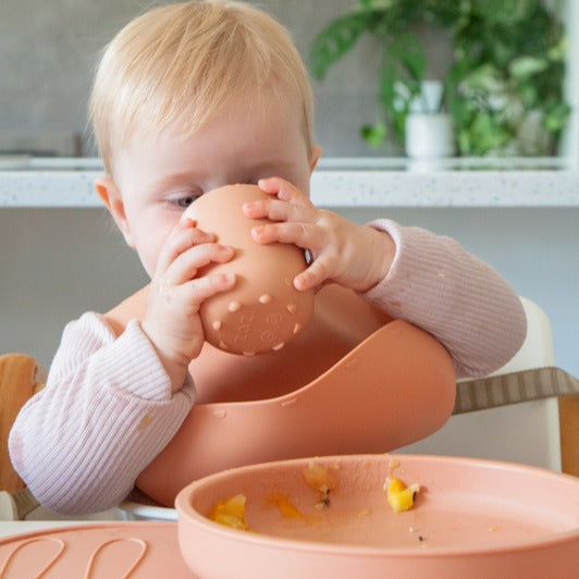 Baby drinking water from zazi clever cup